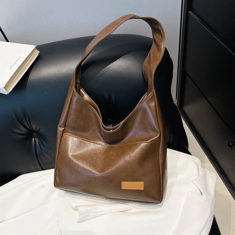 Bolsa de mano retro de gran capacidad coreana nuevo estilo perezoso estilo minimalista para el trabajo de los estudiantes de clase en la mochila