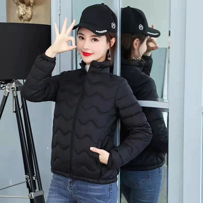 Short winter fitted light and thin black down jacket with down for work