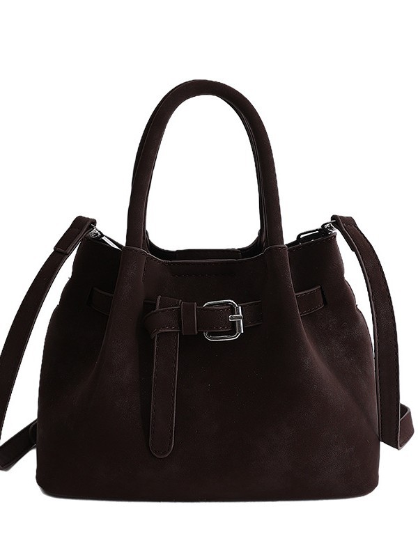 Diseño de nicho simple bolso de cubo portátil para mujeres 2026 nuevo estilo coreano de textura de alta calidad casual versátil bolso de tramo inclinado