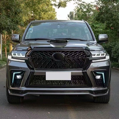 Big Surrounded — Warrior grille, headlight modification