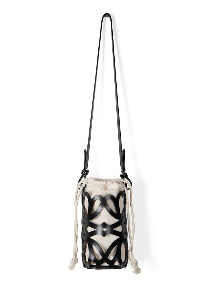 Nuevo bolso bandolera cilíndrico de lona con cordón y diseño coreano de nicho, para mujer, de alta gama, único y versátil.