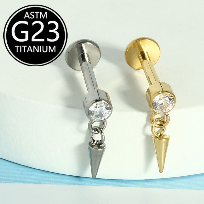 Silver pointed spike labret stud material detail