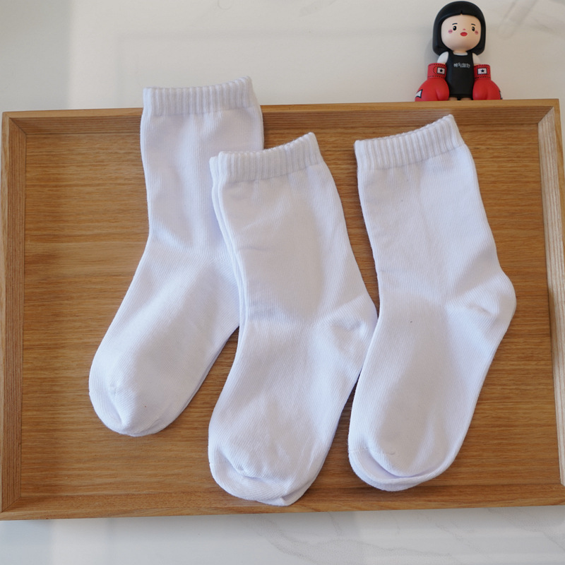 秋冬子供用の白い靴下を卸売りしています。