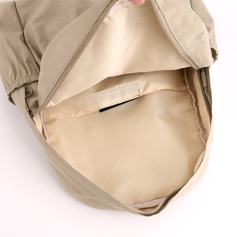 Mochila coreana de tela de nylon de color sólido, mochila de gran capacidad casual simple para estudiantes universitarios de ambos sexos, mochila ligera universal