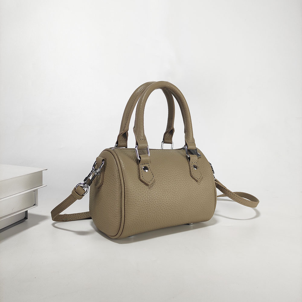 광저우 고급 텍스처 아웃 정품 가죽 보스턴 베개 가방 여성의 2024 새로운 탑 레이어 Cowhide 핸드백