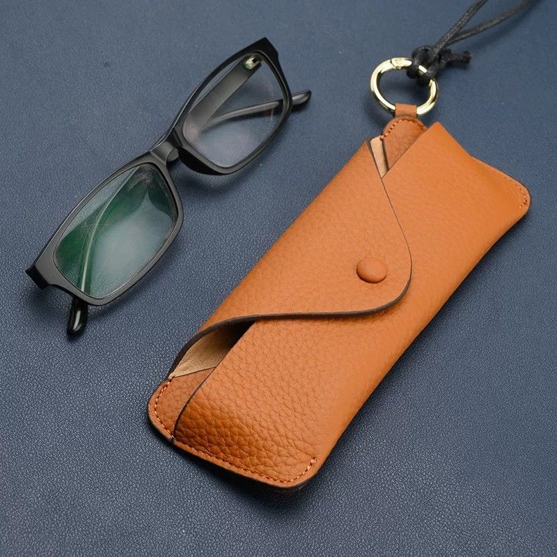 Korean-style genuine leather lychee-pattern portable eyeglass case with hanging buckle and snap button, top-layer cowhide eyeglass case, simple sunglasses storage Korean-style genuine leather lychee-pattern portable eyeglass case with hanging buckle and snap button, top-layer cowhide eyeglass case, simple sunglasses storage