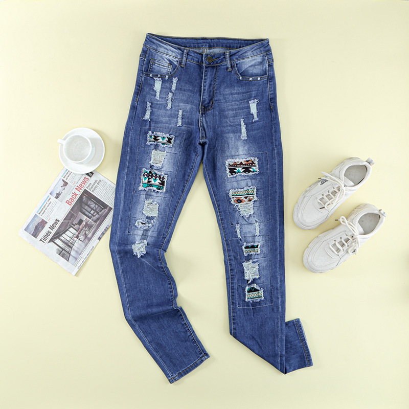 时颖欧美牛仔裤女2022新款破洞拼接时尚修身长款深色小脚裤子女