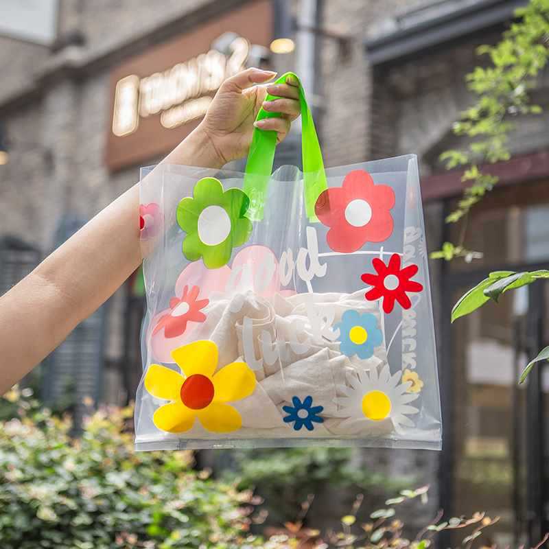 透明袋ins服装店塑料袋装包装子女装拎礼品袋衣服定 制手提袋花朵