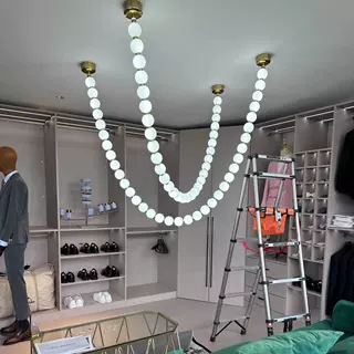 法式中古风珍珠项链吊灯设计师餐厅吧台loft复式楼梯客厅挑空吊灯