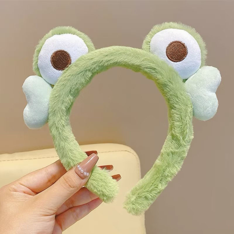Otoño y invierno lindos bandas de cabello de ranas para mujeres máscaras faciales para lavar la cara dibujos animados de peluche bandejas de cabello extrañas tarjetas de cabello al por mayor