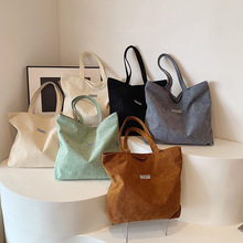 新款托特包简约通勤手提2025大包加厚水洗尼绒袋女大容量单肩布包