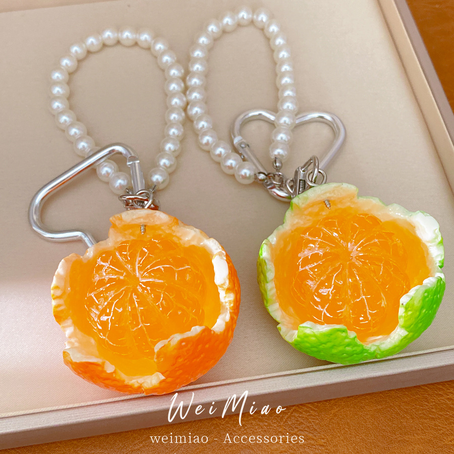 Naranja perla cuentas personalidad temperamento nicho moda cadenas de teléfonos móviles accesorios frescos accesorios al por mayor image 1
