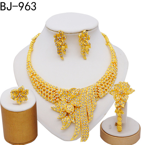 Elegant European and American cross-border exaggerated gold-plated necklace set with earrings, bracelets, and rings embedded with water diamonds.