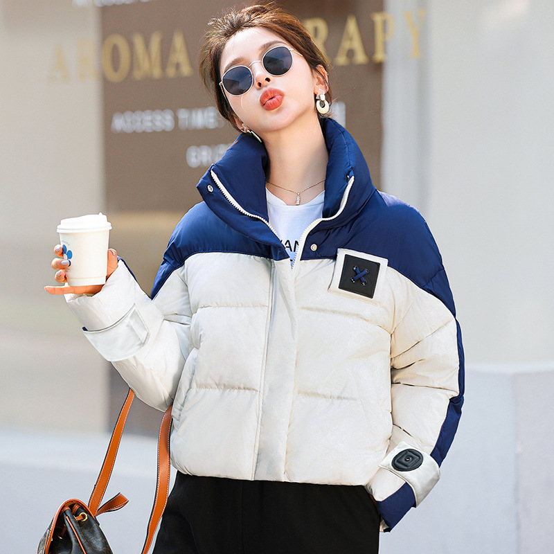 2025 ropa de algodón de pluma para mujeres gruesa corta encapuchada abrigo de moda suelto delgado chaqueta de algodón de invierno ropa de pan caliente