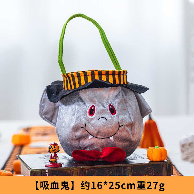 ハロウィーンのカボチャのバケツのキャンディーの袋のかごの子供の贈り物の贈り物は幼稚園の雰囲気を飾って飾っています。|undefined