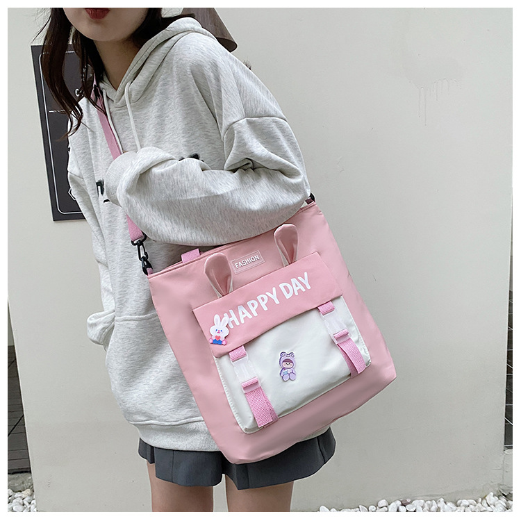 Large-capacity file bag, primary school student handbag that can be carried on one shoulder, book bag for girls with high appearance standards, homework books and test papers bag Application Scenario