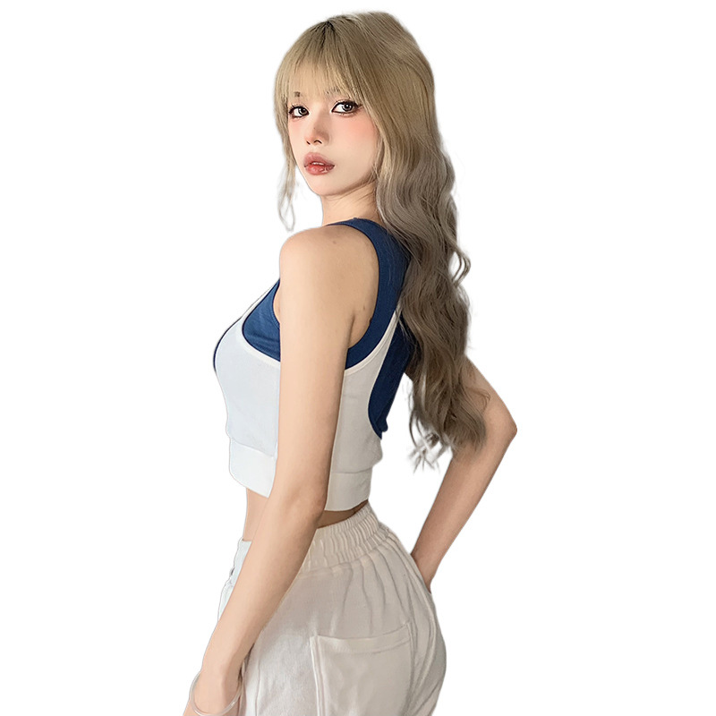 ギャルのベストの女性団風のジャズダンスの修身の短いタイプの臍を露出して踊る上着は色の偽の2つの不規則な外着にぶつかります。