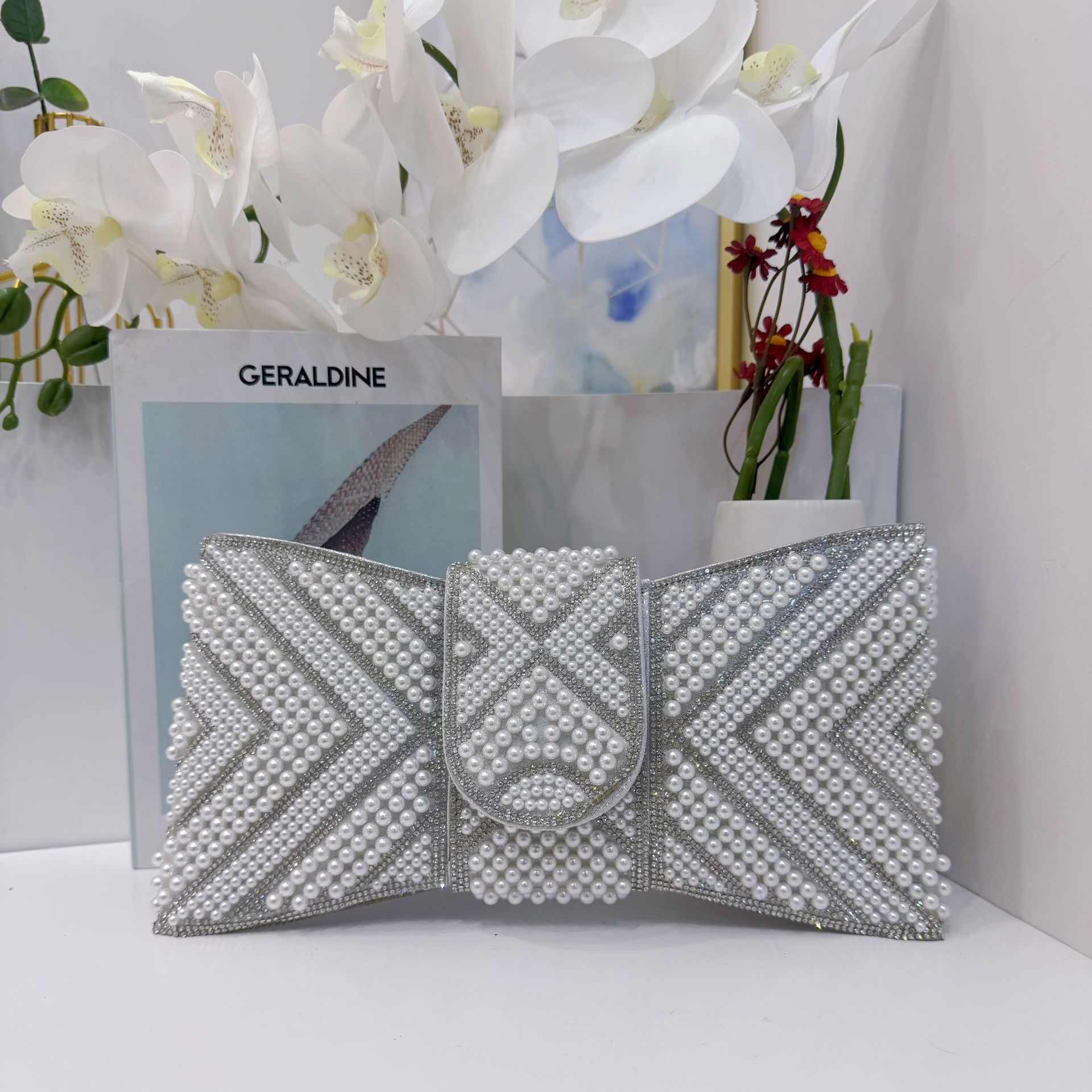 Bolsa de cena de damas transfronterizas, bolsa de mano de lujo ligera, perlas de diamante, bolsa de cena de arco inclinada de hombro único