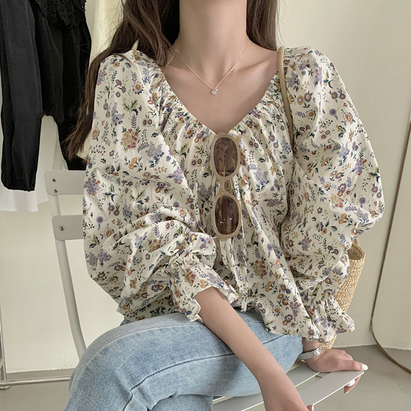 Venta al por mayor transfronteriza versión coreana de la camisa de diseño con cordón de un hombro floral femenina delgada y dulce 1688 al por mayor