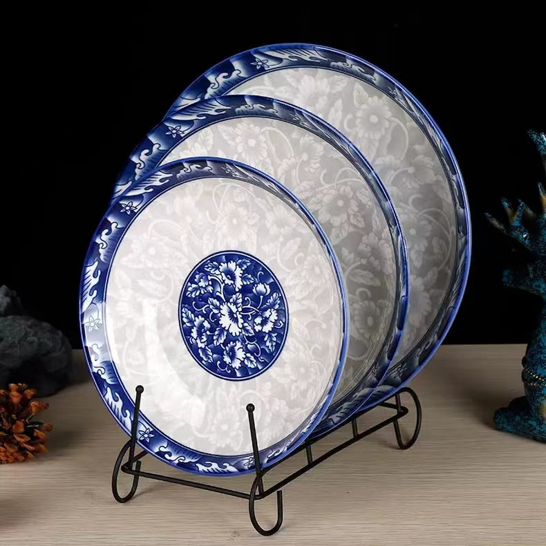 Comercio electrónico al por mayor de impresión verde cuencos y platos de cerámica se adaptan a las necesidades diarias vajilla de porcelana azul y blanca dos yuanes más que el suministro de la tienda