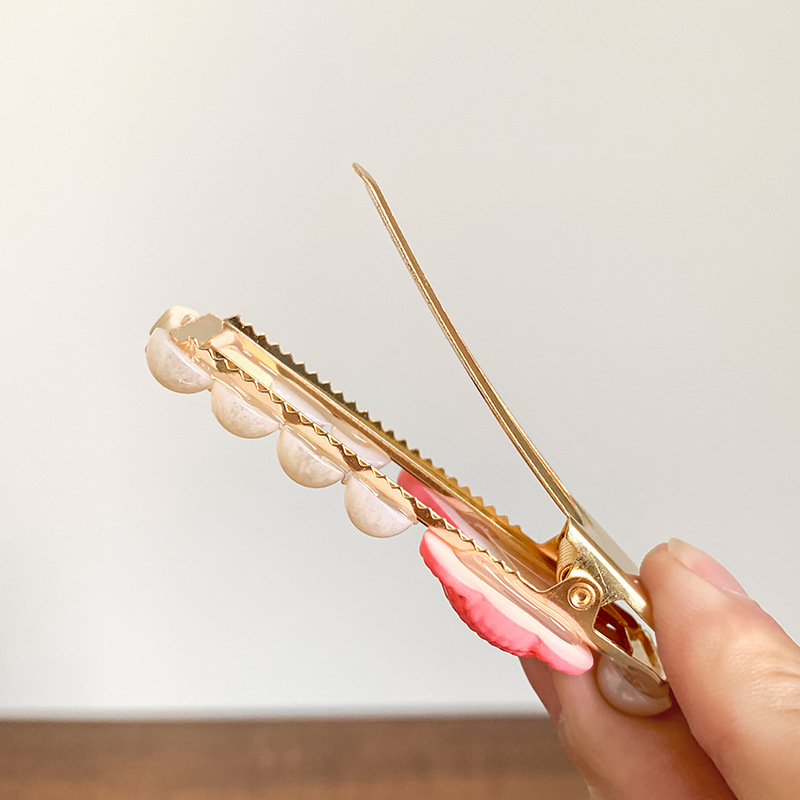 Ventas directas de fábrica 2025 nueva horquilla de color para mujer nueva pinza de flequillo lateral linda horquilla rota pinza de una palabra dulce