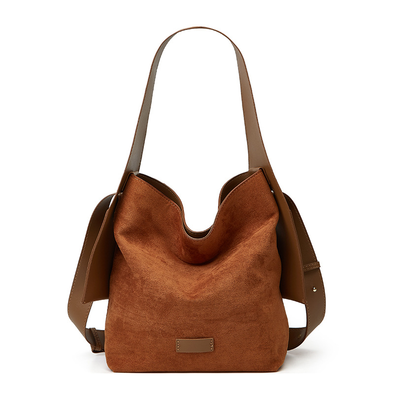 Bolso especial de orejas colgantes de songmont bolso de mujer grande y medio de cuero suave universal de un solo hombro bolso de mano