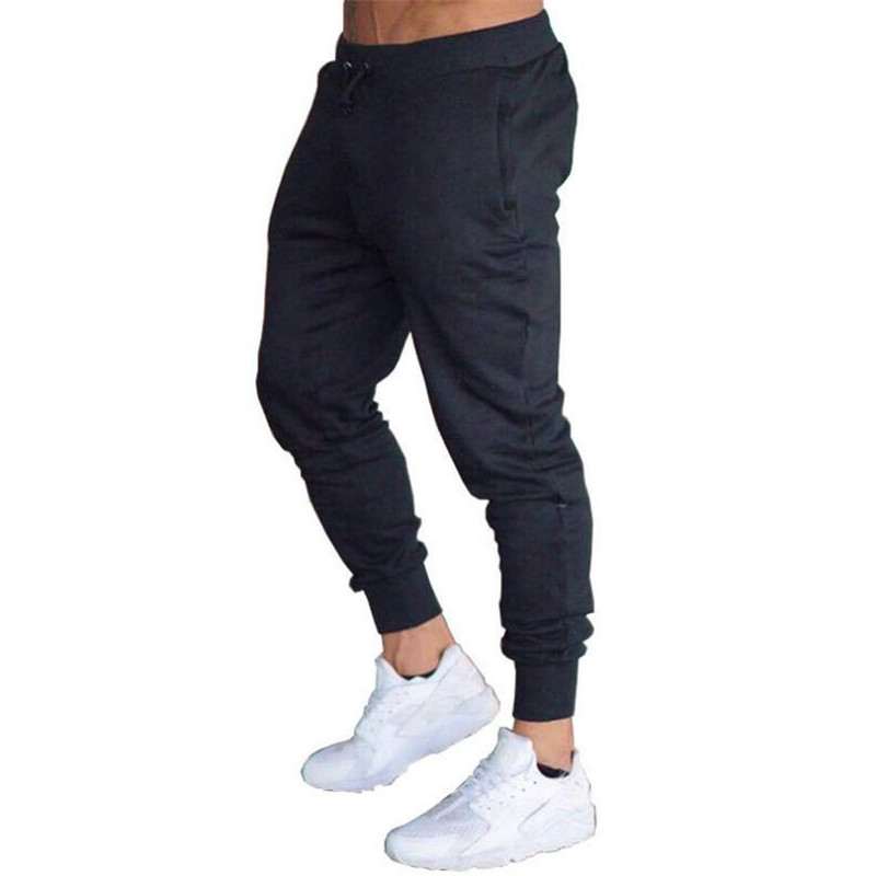 Foreign trade thin spring and autumn men's sports pants fitness running trousers solid color fashion casual pencil pants jogging pants