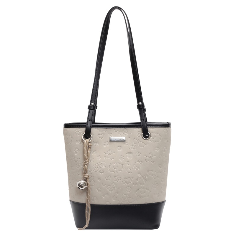 Bolso de tendencia versátil para mujeres 2025, nuevo bolso de cubo de moda casual, bolso de hombro de nicho de alta calidad