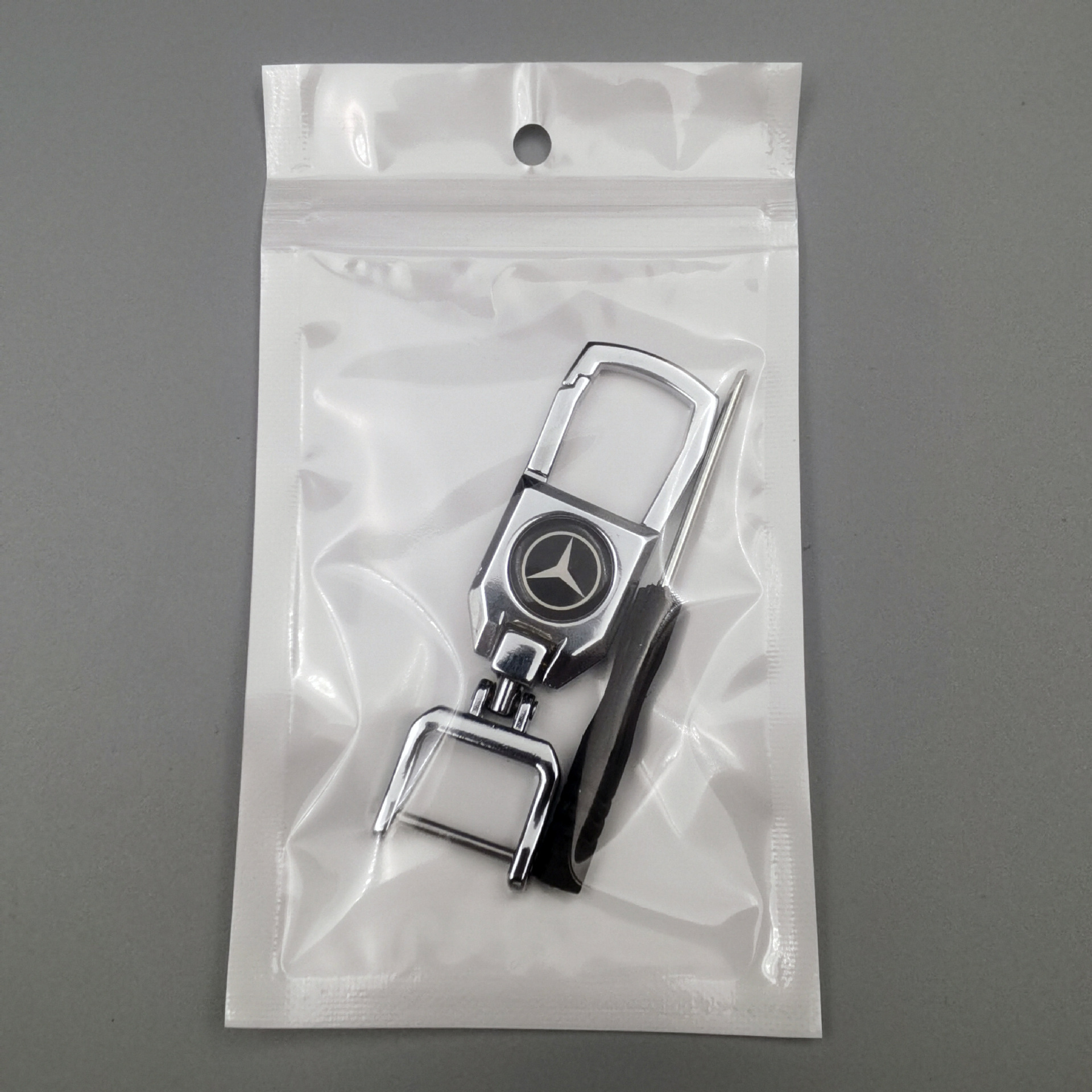 Comercio electrónico llavero de coche explosivo todo fósforo hebilla de metal logotipo de coche logotipo de negocio creativo llavero colgante de hombre