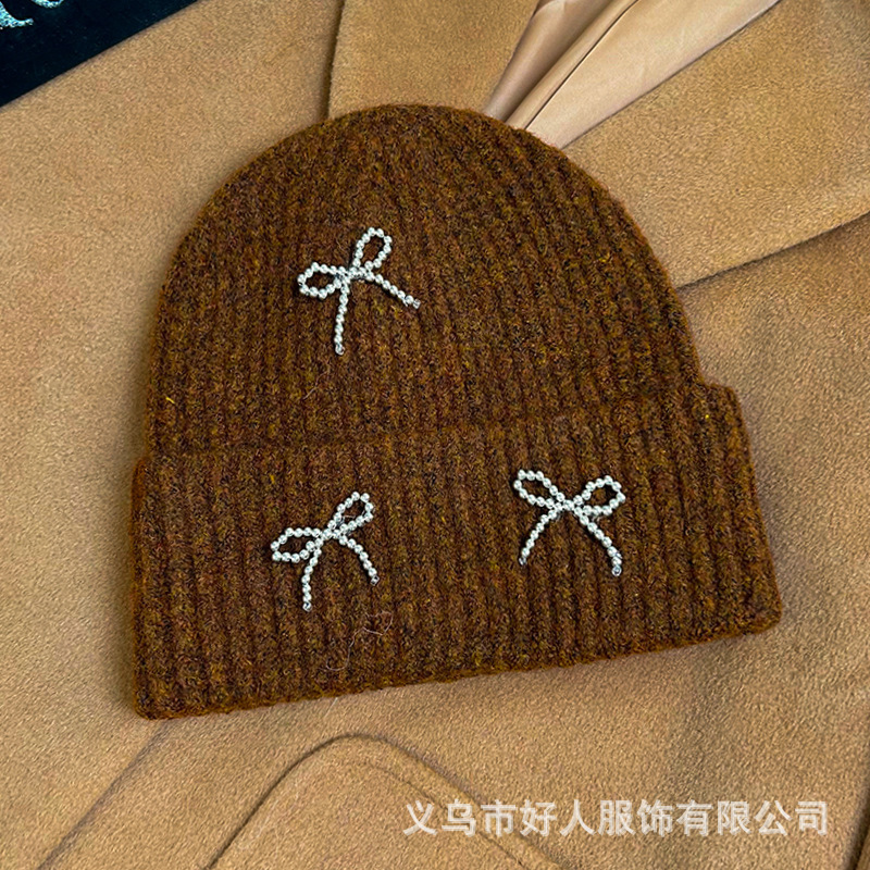 韓国版のファッションの新型の小さい香風の真珠の蝶結びの毛糸の帽子の大きい頭の周りの耳のメリヤスの冷たい帽子の頭の帽子の潮|undefined