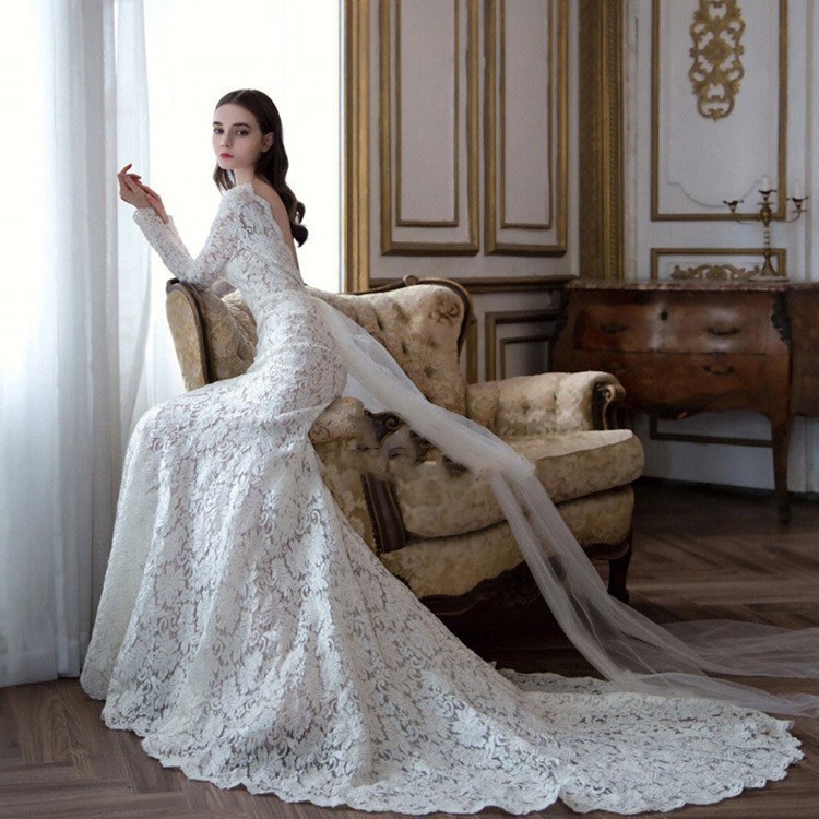 El comercio exterior de encaje francés de cola de pescado ligero vestido de boda 2024 nuevo vestido de novia de encaje de manga larga vestido de alta calidad