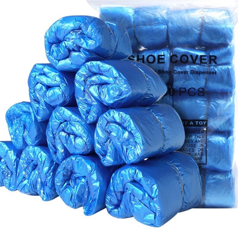Fábrica al por mayor desechable PE cubierta de zapatos no tejida cubierta de pie engrosada hogar T-tipo máquina de plástico zapatos película antideslizante