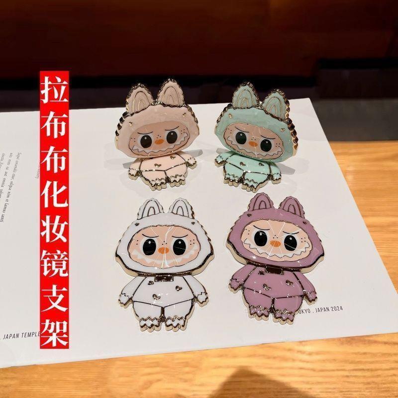 漫画かわいいラブブ携帯電話ホルダーラブブ化粧鏡ホルダーミラー携帯電話ホルダーは回転して折りたたむことができます|undefined