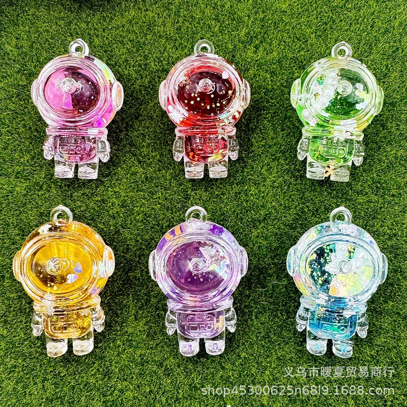 Cartoon oil floating astronaut quicksand bottle key chain cute acrylic bag space doll key chain