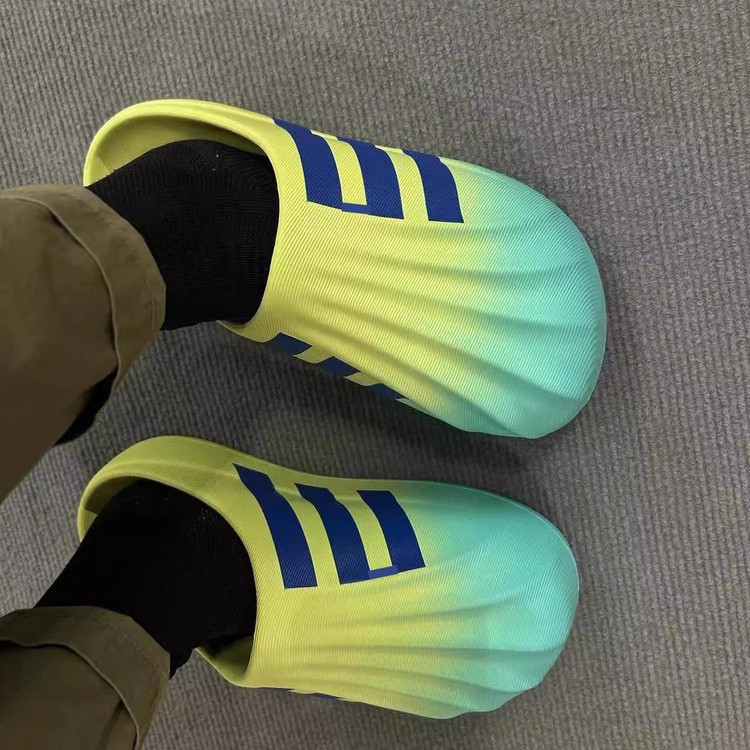 Putian EVA auténtico primavera y otoño nuevo tipo de zapatillas de cabeza de conchas de dopamina para hombres y mujeres zapatillas de agujero de fondo grueso