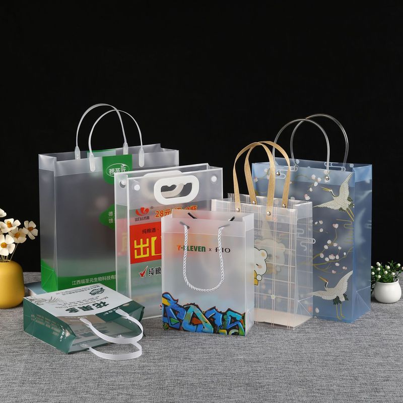 クロスボーダー新しい PVC ハンドバッグ pp スナッププラスチック透明赤ワインバッグ学生外出ポータブルショッピングバッグのカスタマイズ|undefined