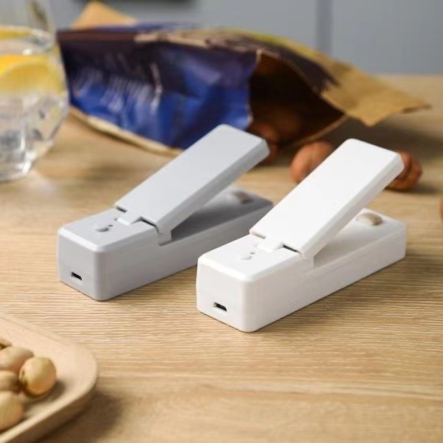 Dispositivo de sellado de carga USB clip de sellado presión de la mano máquina de sellado de plástico máquina de sellado pequeña merienda doméstica mini máquina de sellado