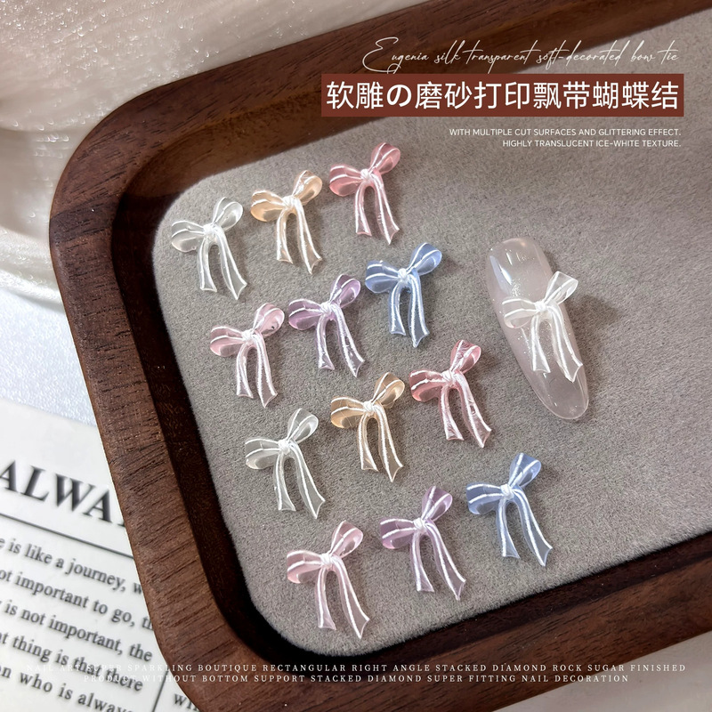 Hot-selling satin finish soft-cut butterfly nail art decorations, transparent iridescent ribbon butterfly nail rhinestone accessories, wholesale Hot-selling satin finish soft-cut butterfly nail art decorations, transparent iridescent ribbon butterfly nail rhinestone accessories, wholesale