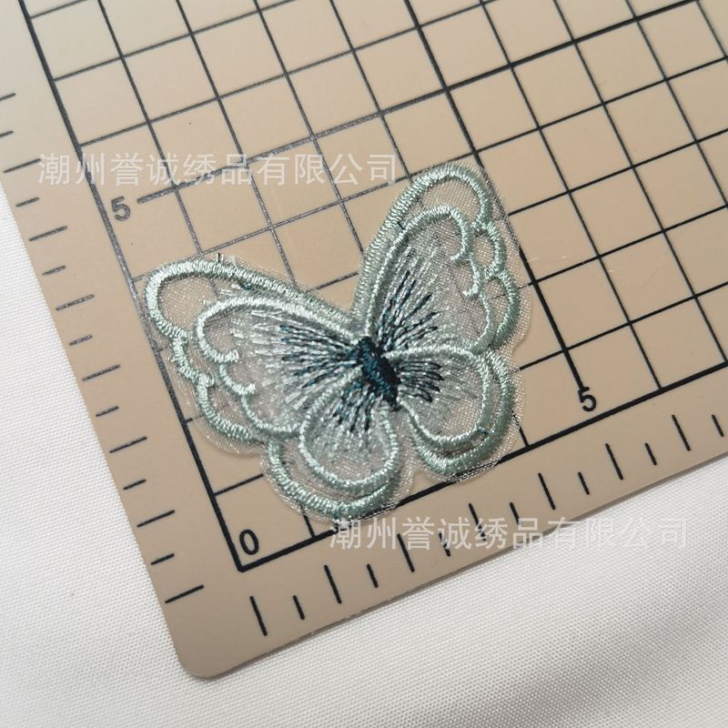 欧根紗二重金糸蝶刺繍レース布はグラデーション色刺繍補助材料の髪飾りヘアピン服装パッチを貼っている|undefined