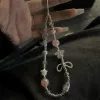 Beads with bow, flowered