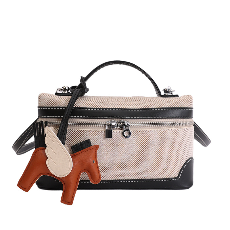 Caja de mano retro europea y americana bolsos pequeños cuadrados para mujeres nuevas ventas calientes de lona transfronteriza color de empalme de hombro único
