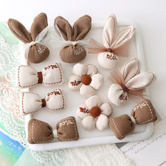 2023秋冬新款韓版網紅兔子五瓣花充棉領結頭飾配件服裝靴子包輔料