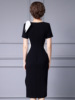 Black and white color block square collar exposed collarbone acetic acid wrapped hip skirt 2024 summer