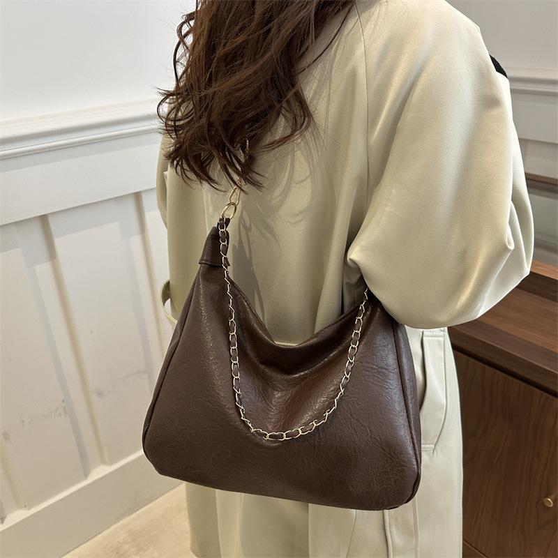 2024 bolso de estudiantes coreano para mujeres de gran capacidad nicho versátil bolso de hombro de alto nivel bolso de cubo de cadena