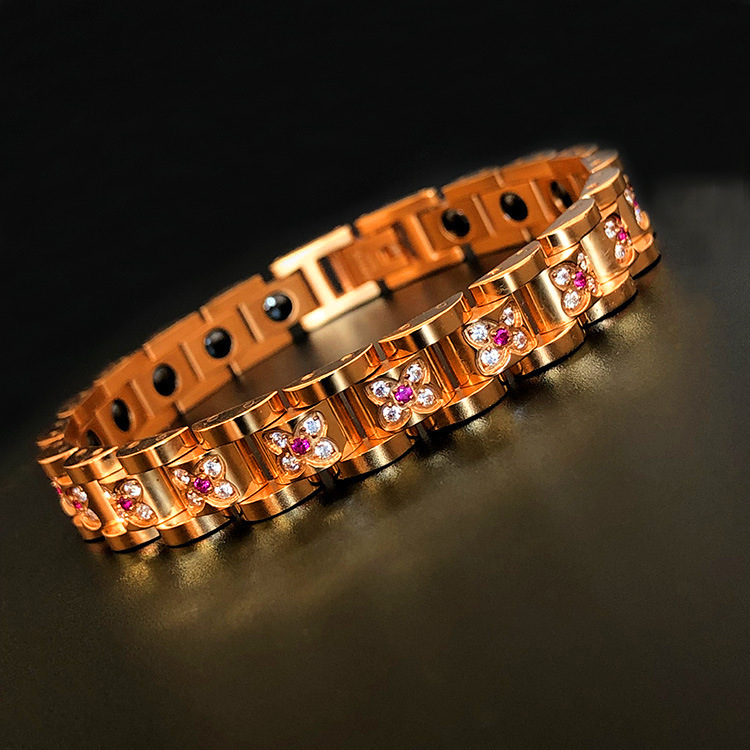 Pulsera de acero inoxidable al por mayor de AliExpress con diamantes de color rojo, joyería de cadena magnética dorada para hombre.