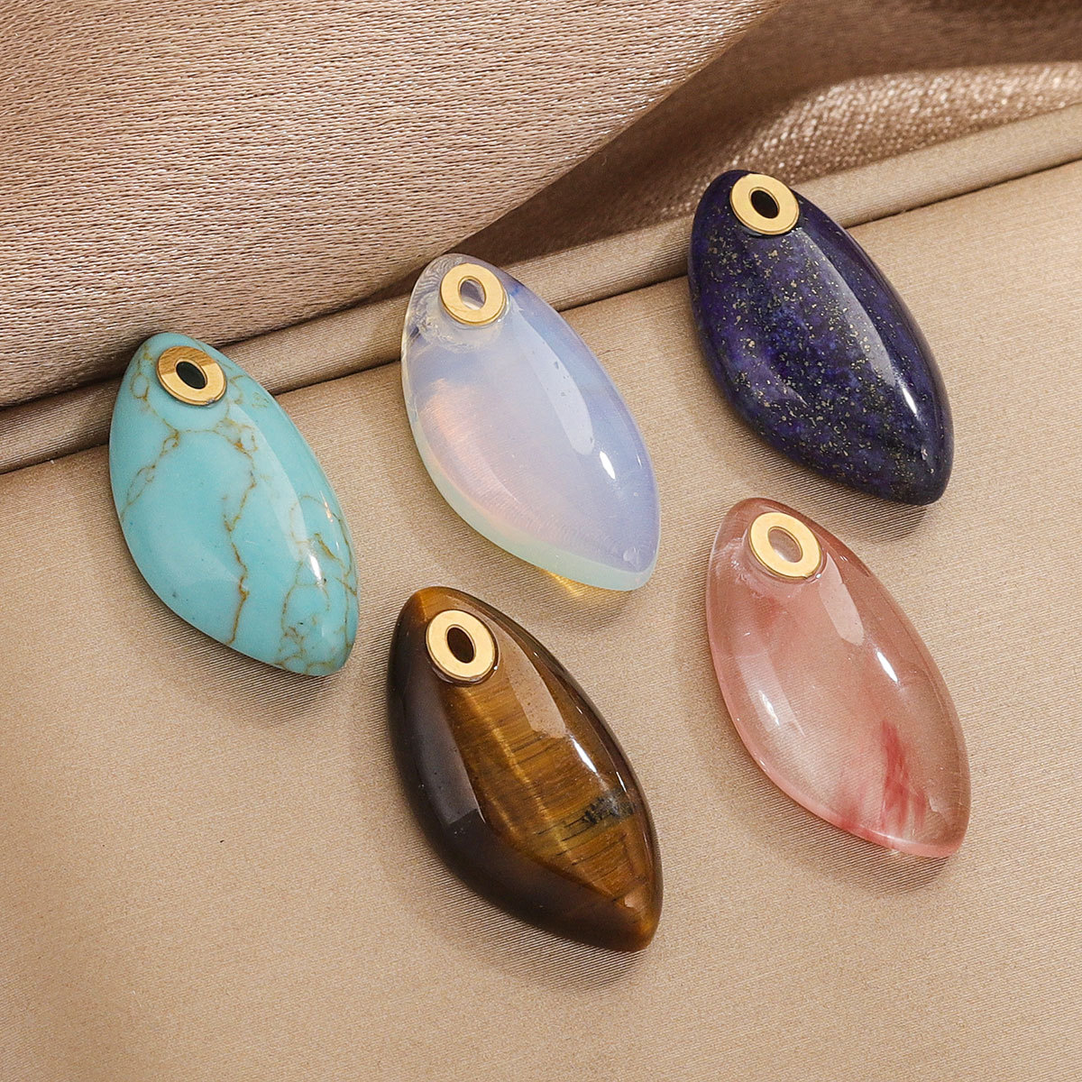 Europa y los Estados Unidos piedra natural polvo cristal turquesa acero inoxidable titanio elíptico pequeño colgante DIY accesorios de collar