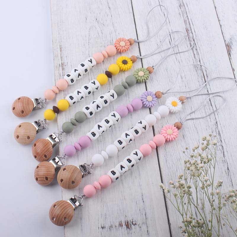 Nuevo bebé suministros de dibujos animados Margarita silicona mordedor creativo DIY nombre mordedura pegamento molar pezón cadena