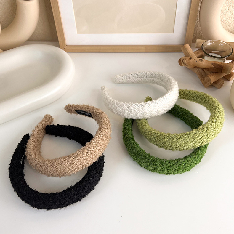 韓国の秋冬の編み物の高い頭の頂の広い辺のカチューシャの女性の外出の百合の髪の気質の毛のカチューシャの頭の飾り