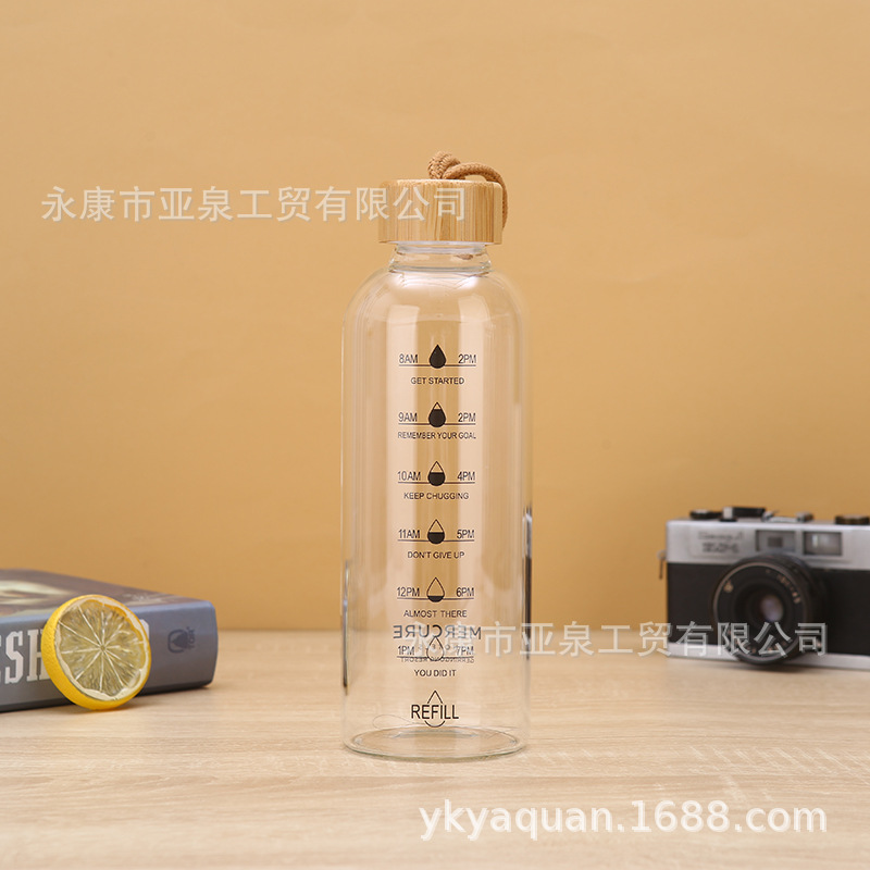 Fabricantes de suministro de copas de bambú portátiles de vidrio transparente aislamiento térmico taza de agua de oficina acompañante taza de regalo se puede imprimir logotipo