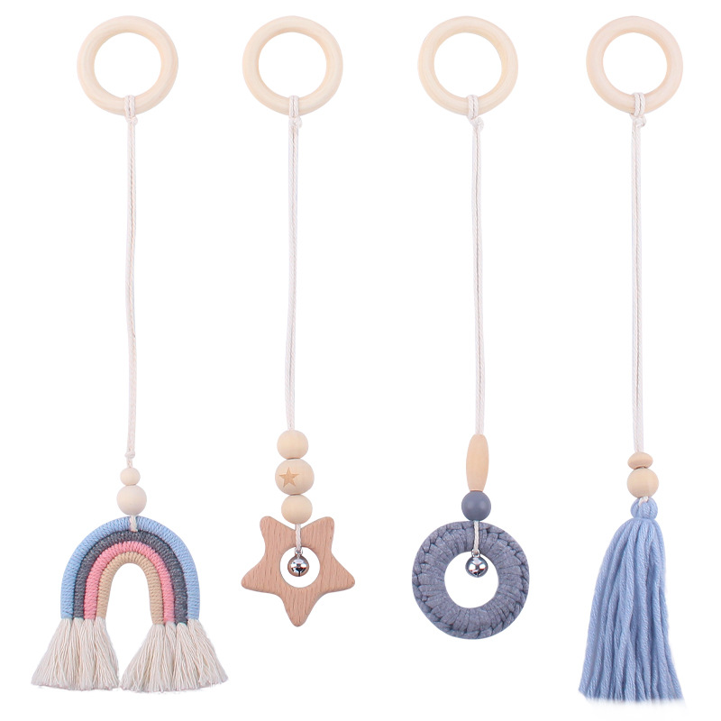 Bebé suministros dibujos animados Arco Iris colgante de cuatro piezas niños de educación temprana hecho a mano tejida haya sonajero juguete